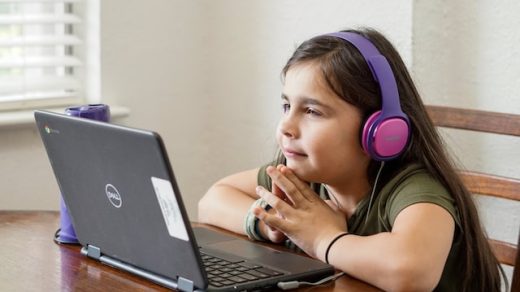 girl listening in an online class